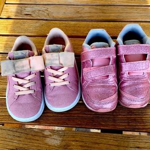 2 pairs of pink Puma shoes